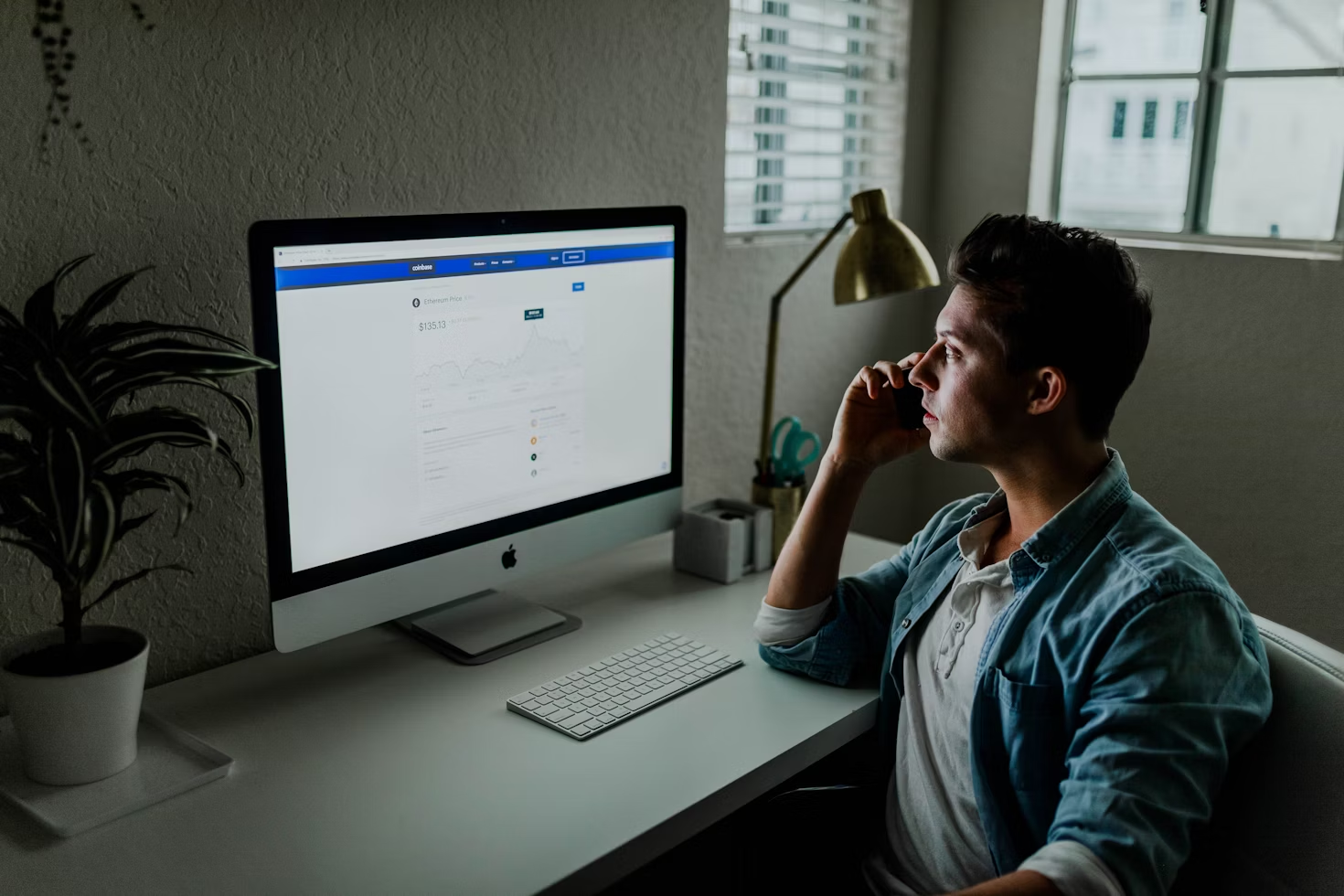A person looking at a monitor
