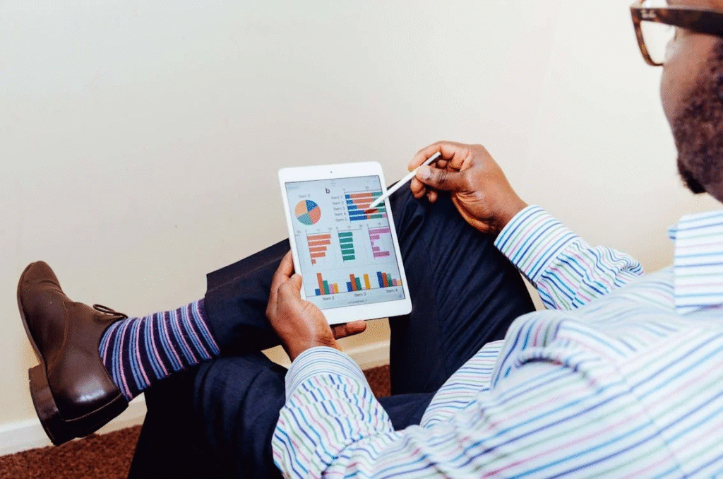 A person looking at statistics on a tablet