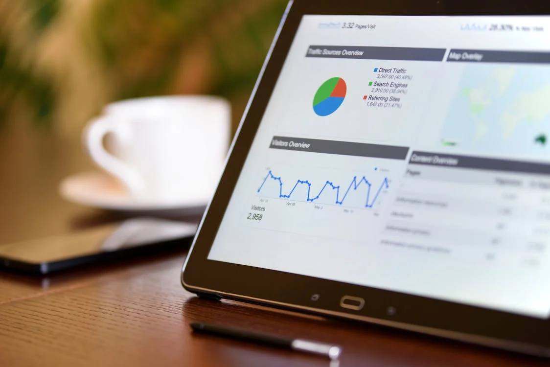 A tablet showing the analytics of an online business